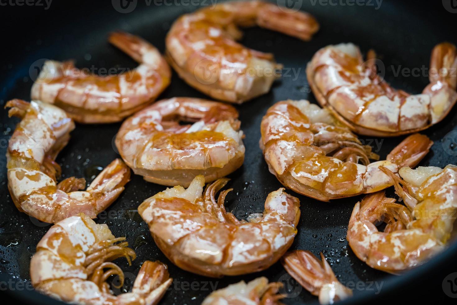 Easy peel shrimps in a pan photo