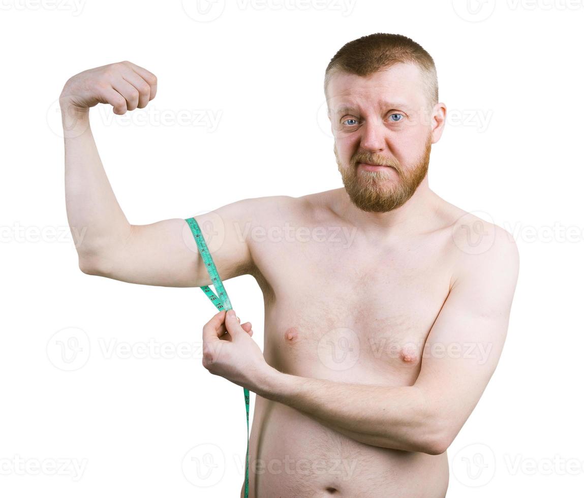 Bearded man measures the size of your biceps photo