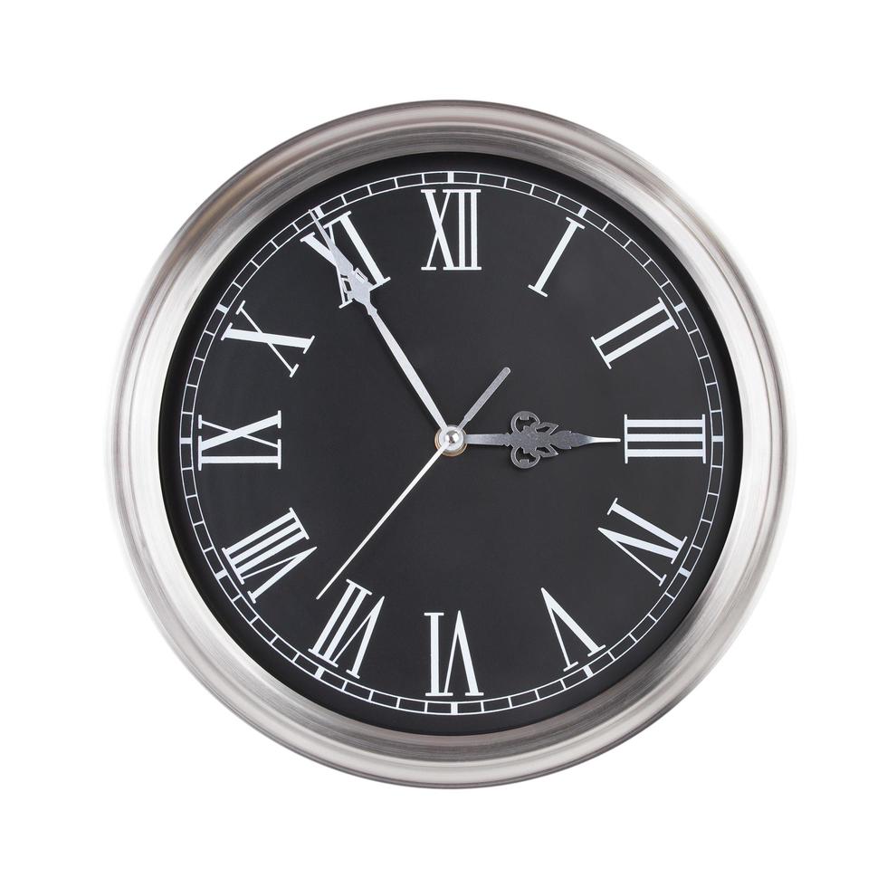 Round clock shows five minutes to three photo