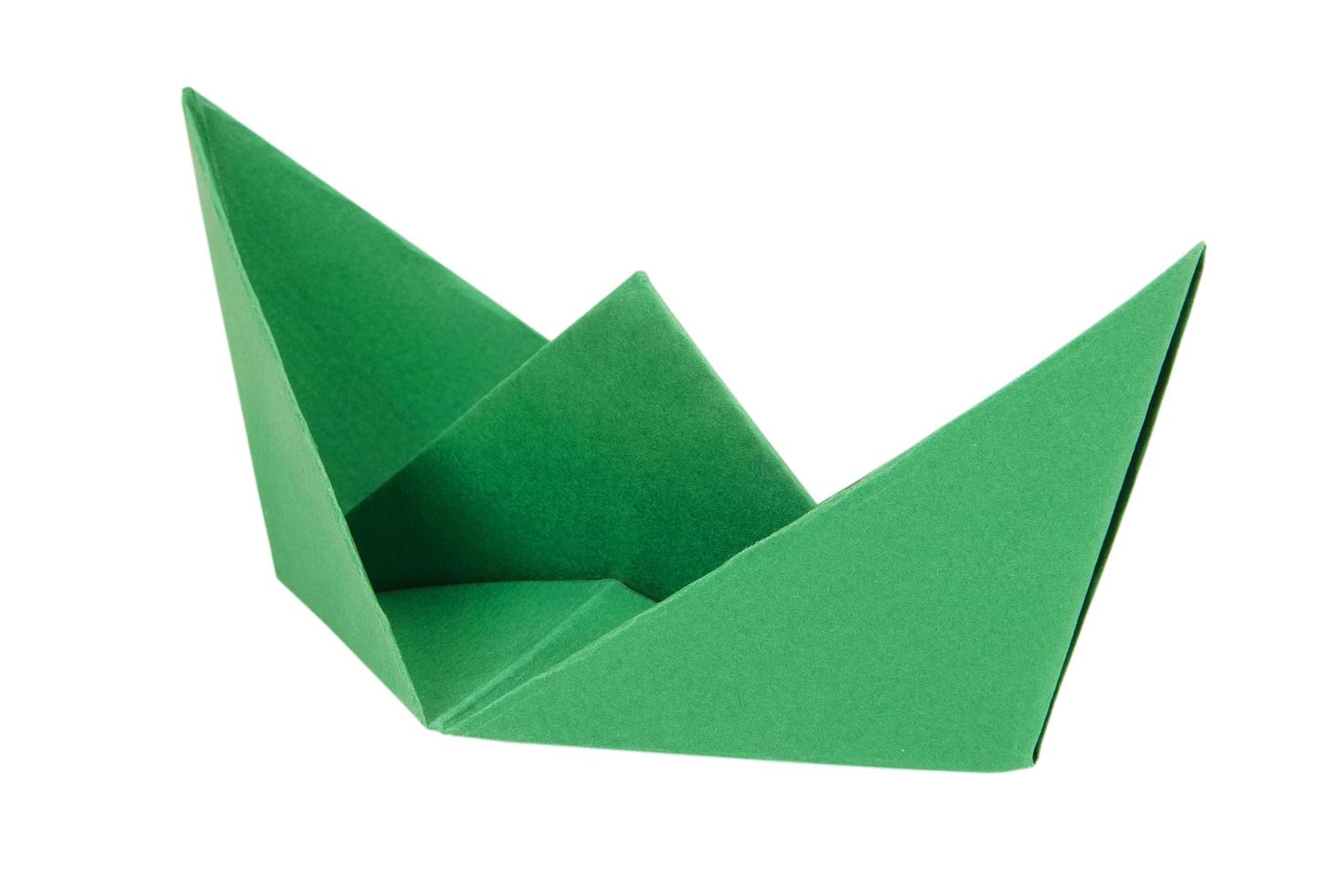 Green boat made of paper photo