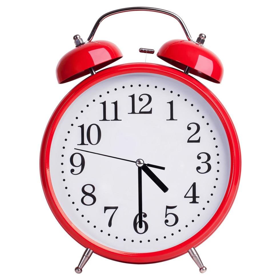Round alarm clock shows half past four 3512791 Stock Photo at Vecteezy