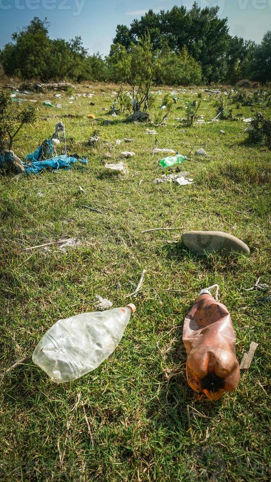 Garbage riverside - trash on river shores photo