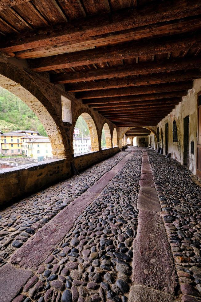 Scenic view of ancient village and its stunning old arcaded street photo