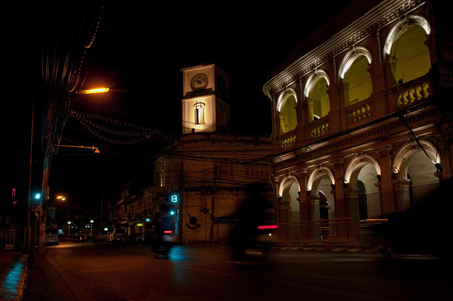 Chino Portuguese clock tower in phuket old town, Thailand photo