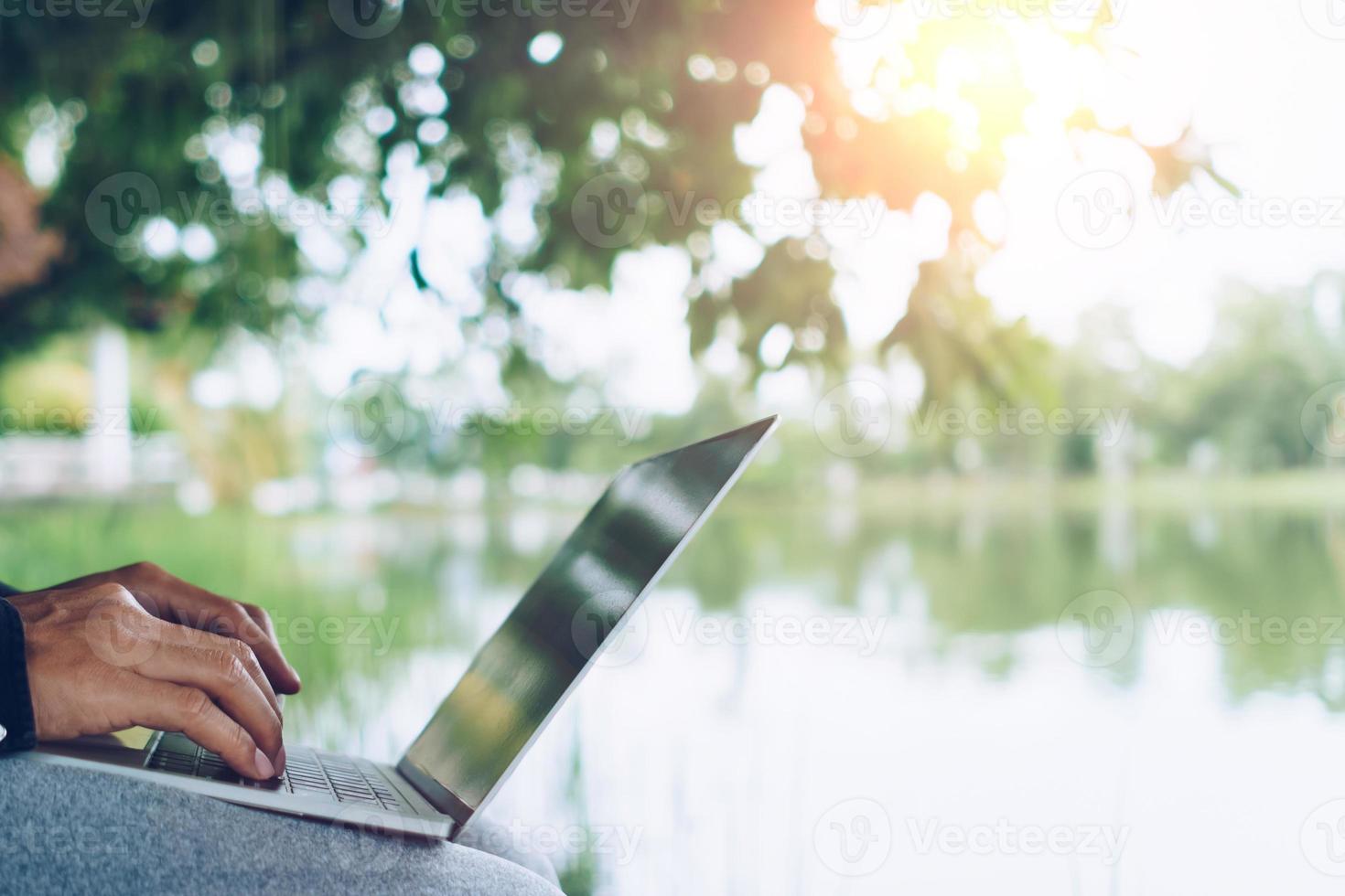 People using laptop to work study on work desk. Business, financial, trade stock maket and social network. photo