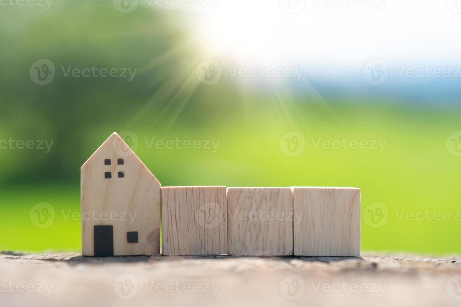 In a hand-held background, a blank wooden cube can be used to add text. photo