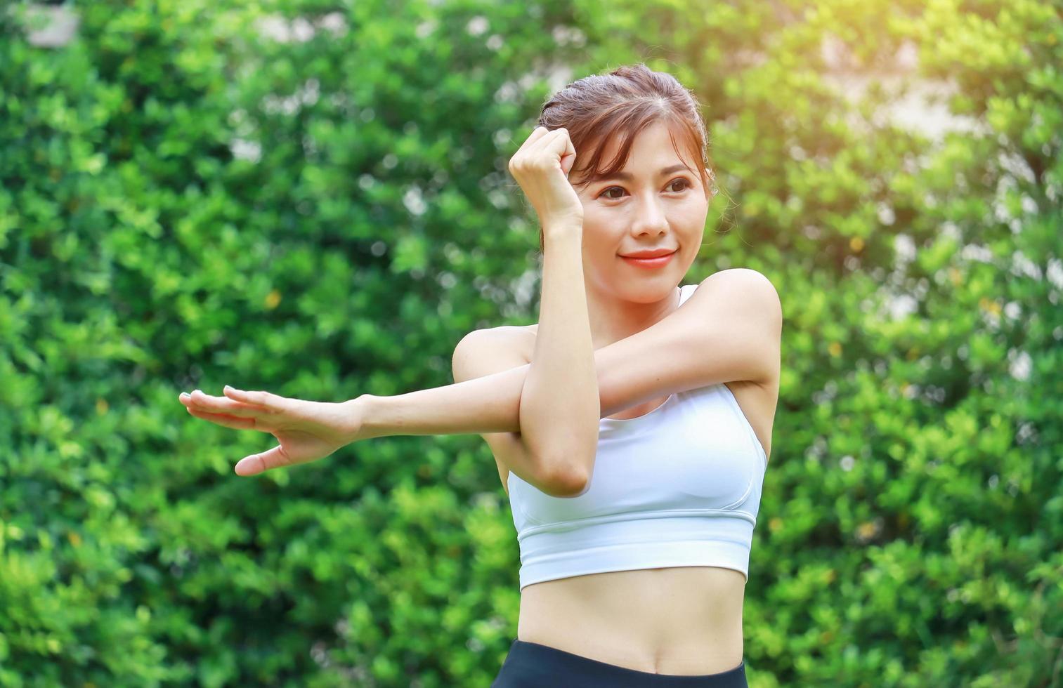 Woman exercising in the park photo