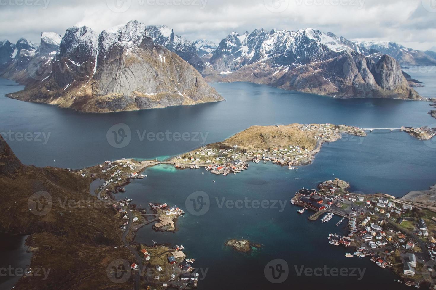 Scenic landscape of Lofoten islands - peaks, lakes, houses photo