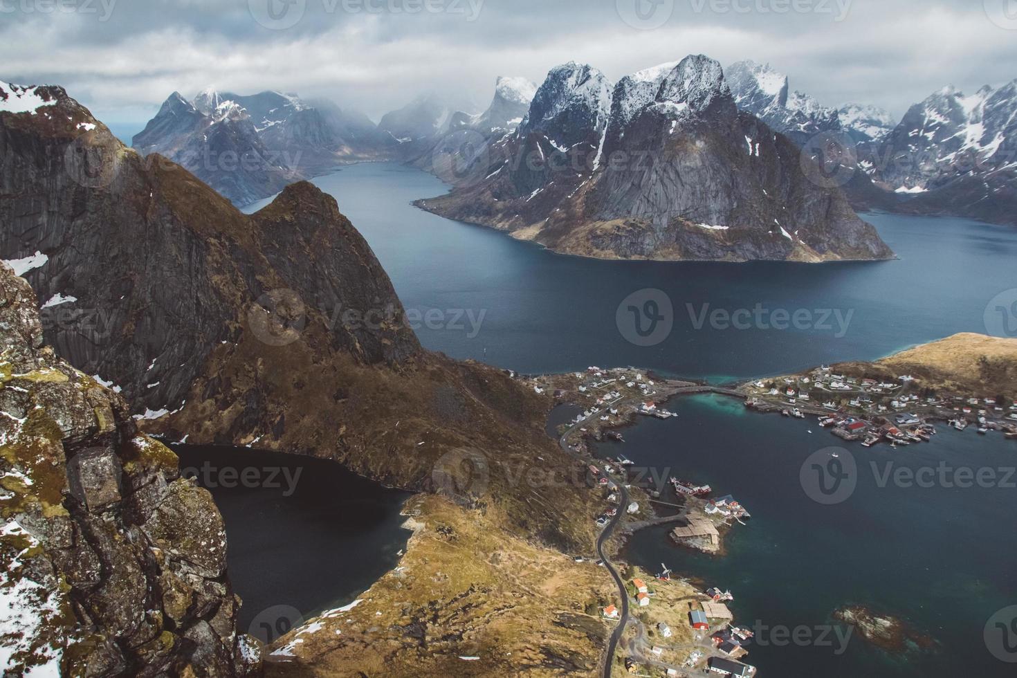 Scenic landscape of Lofoten islands - peaks, lakes, houses photo