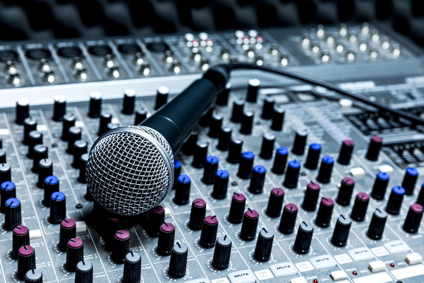 Professional studio microphone over music studio Stock Photo by