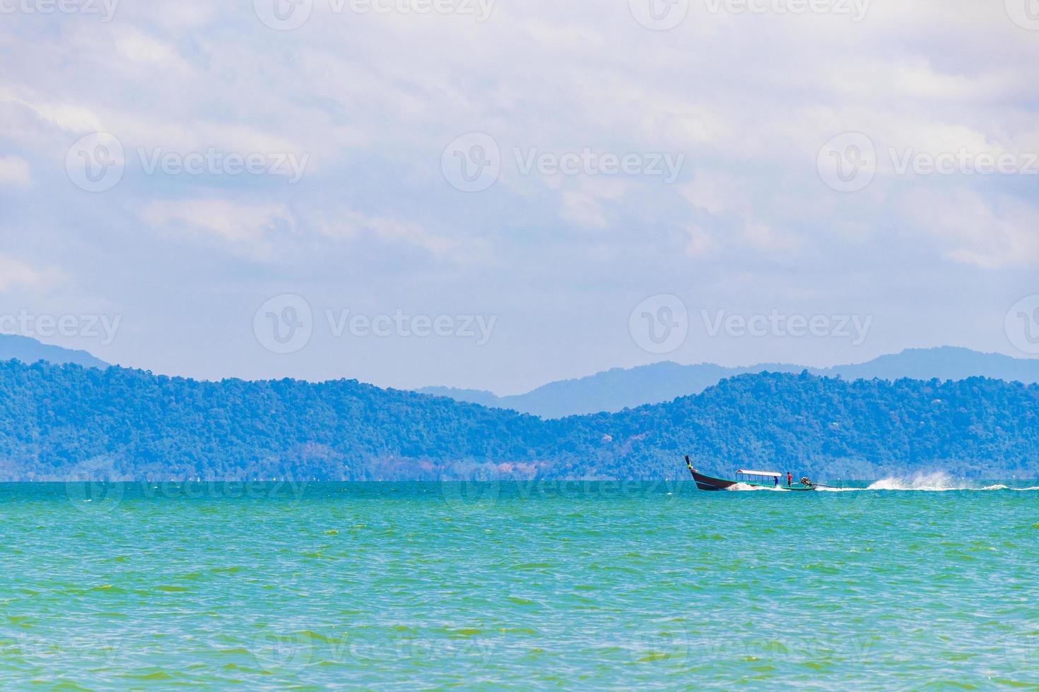 Longtail boat at tropical Paradise of Ranong in Thailand photo