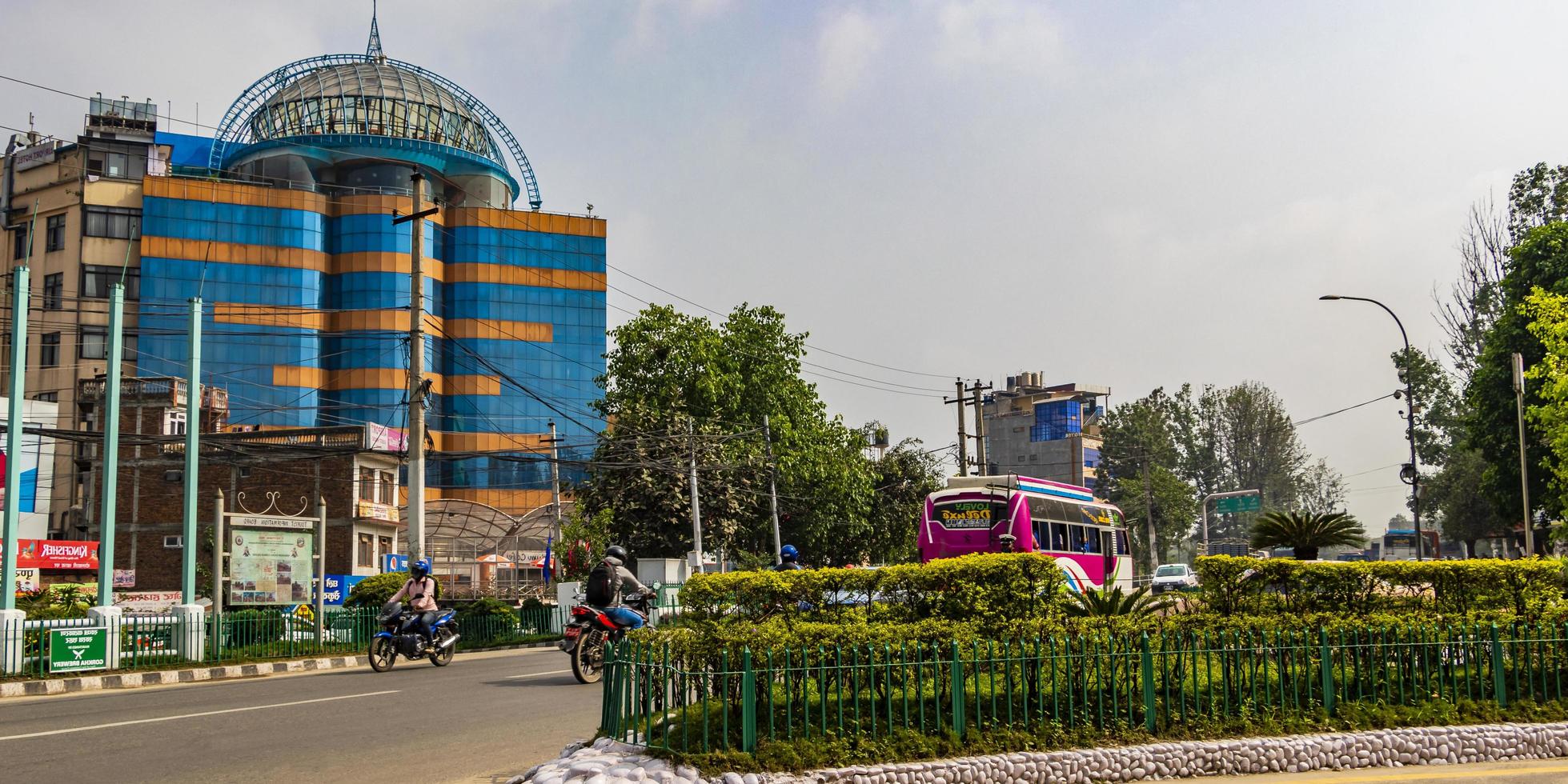 Colorful dusty road to the airport. Ring Road, Kathmandu, Nepal. photo