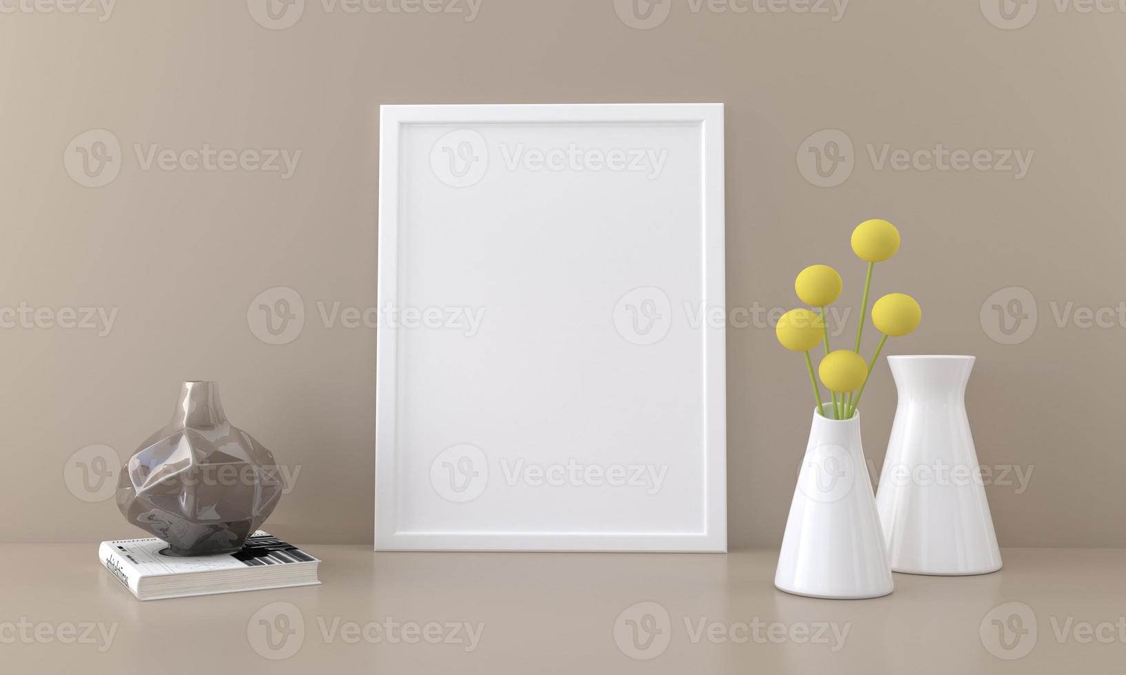 A blank picture frame and vases on a table photo