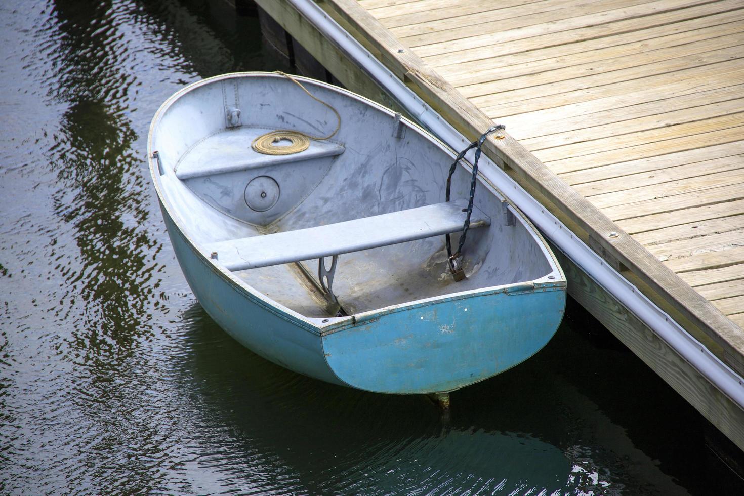 Wooden boats near a dock in the harbor photo