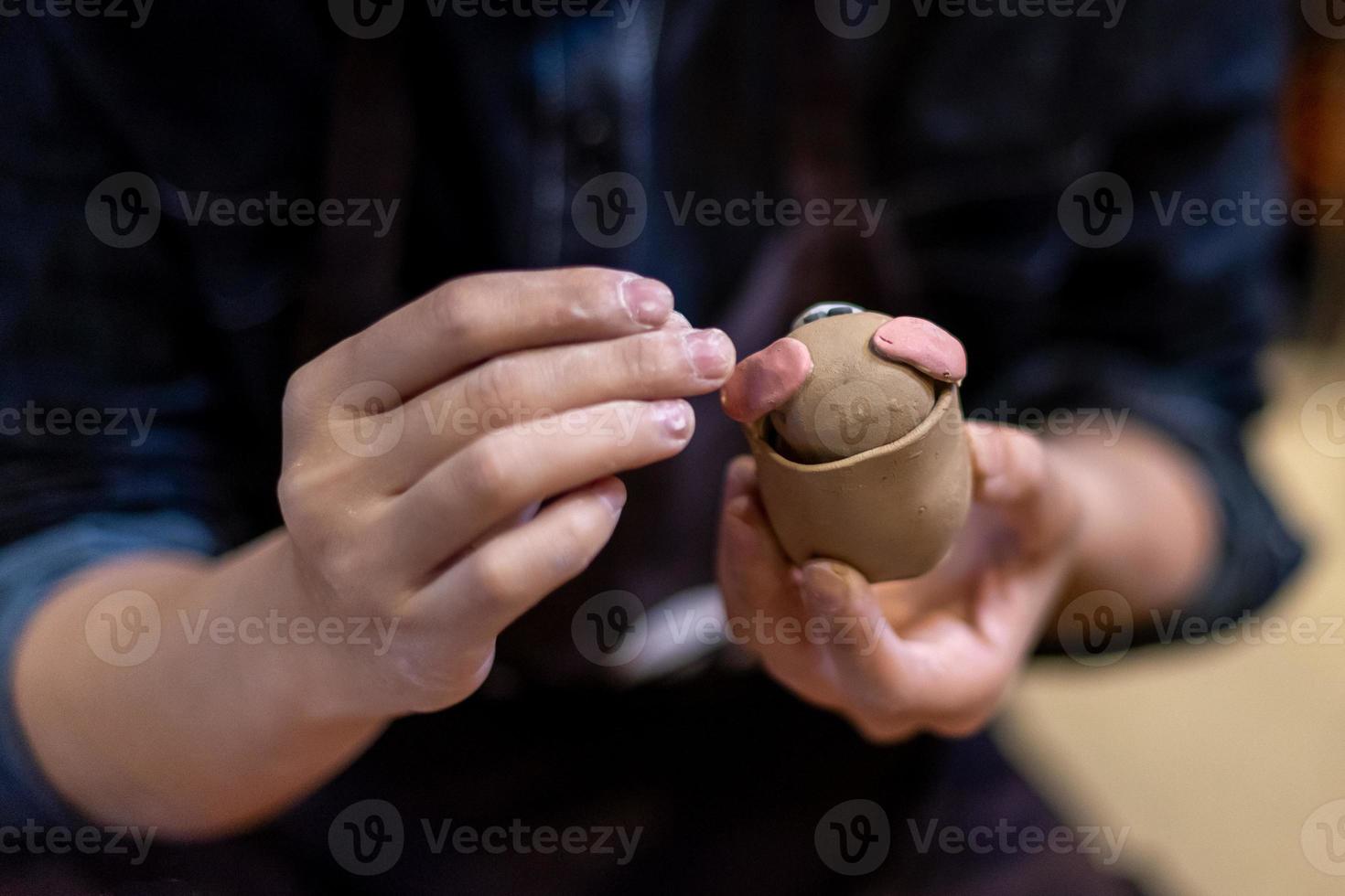 The process of making pottery in a Pottery Workshop photo