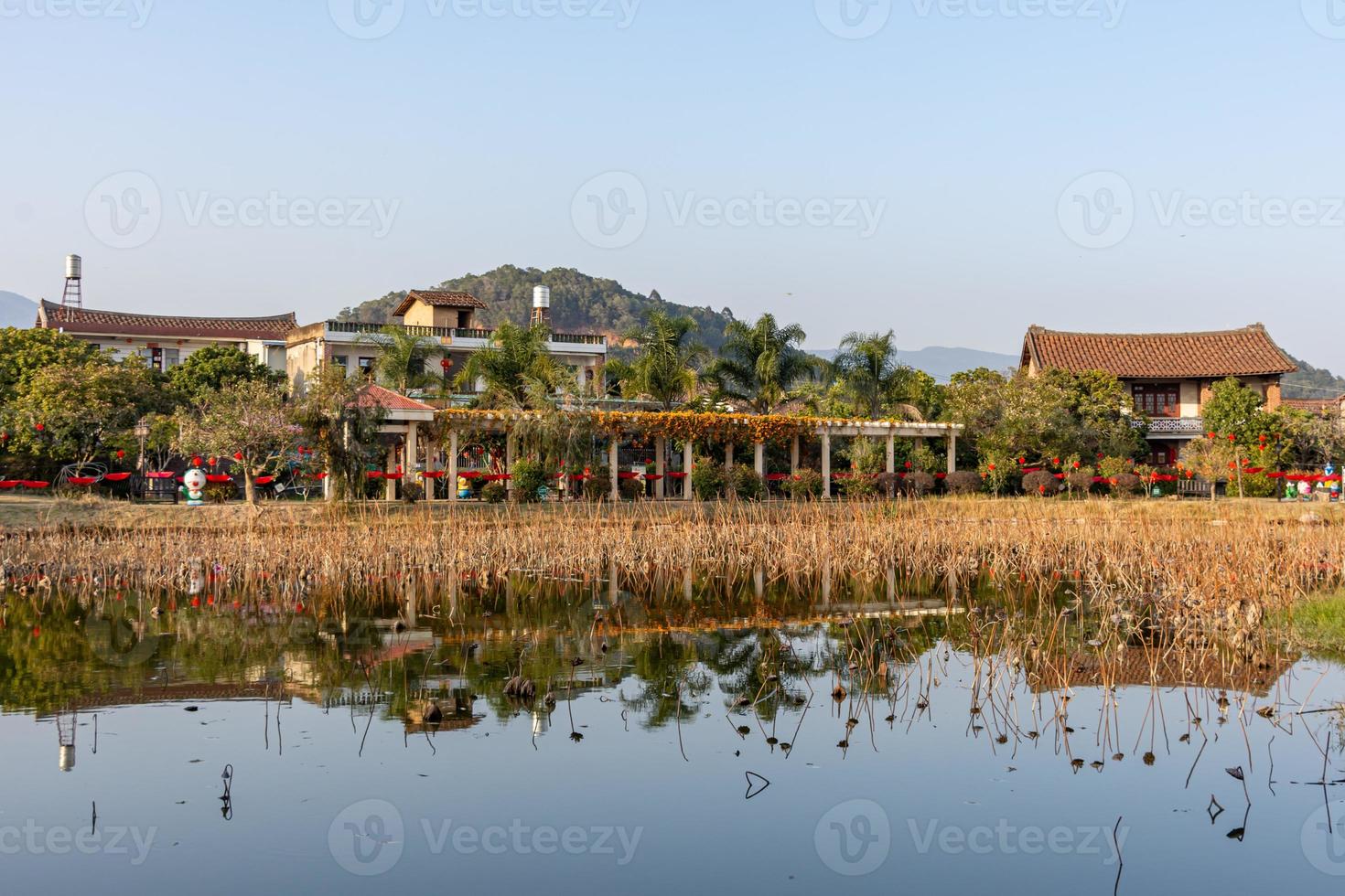 The lake in autumn reflects the scenery on both sides photo