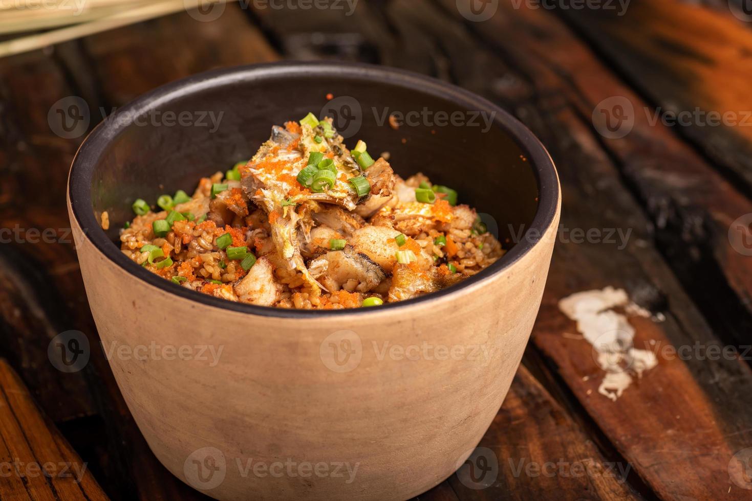 Platos tradicionales chinos para banquetes, arroz guisado de corvina amarilla. foto