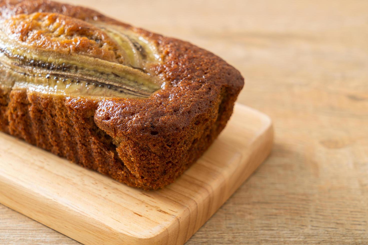 Banana cake on wood board photo