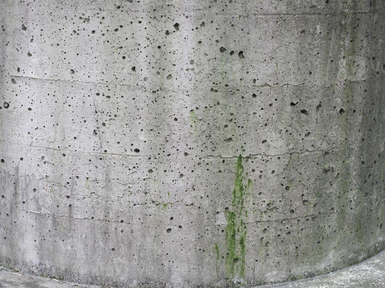 Weathered grey concrete with moss texture background photo