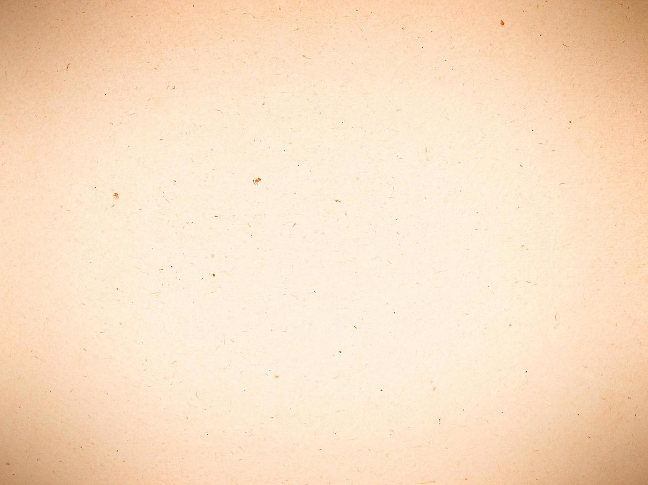 Old brown paper background with dark vignette. photo