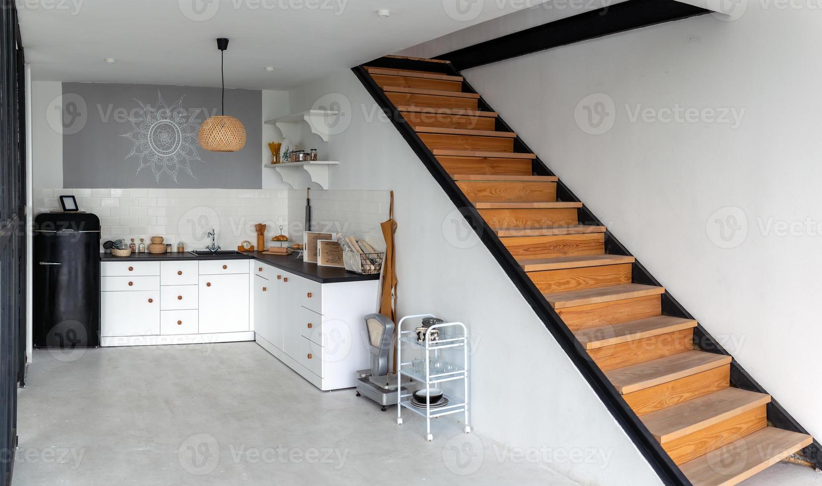 Minimalist wooden stairs in a clean, large space. photo