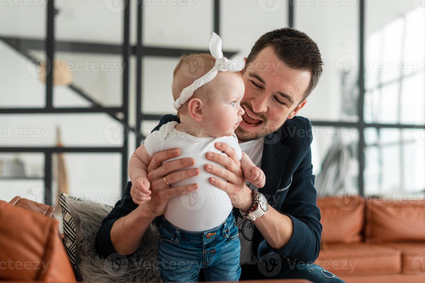 A loving father and his daughter have fun photo