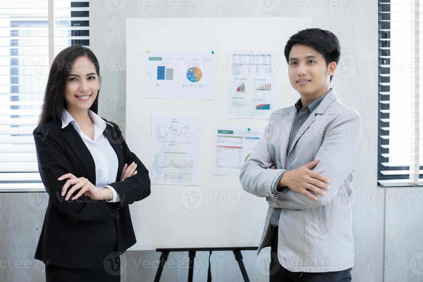 Asian businesswomen and group using notebook for business partners discussing documents and ideas at meeting and business women smiling happy for working photo