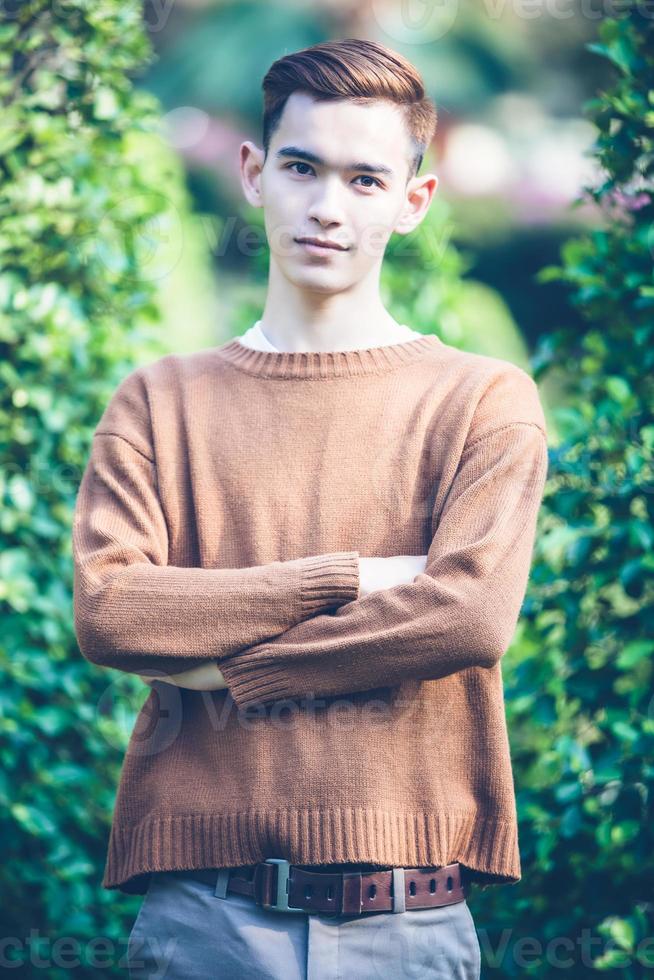 Asian handsome man smiling model in park photo