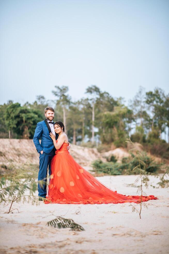 Asian bride and Caucasian groom have romance time and happy together photo