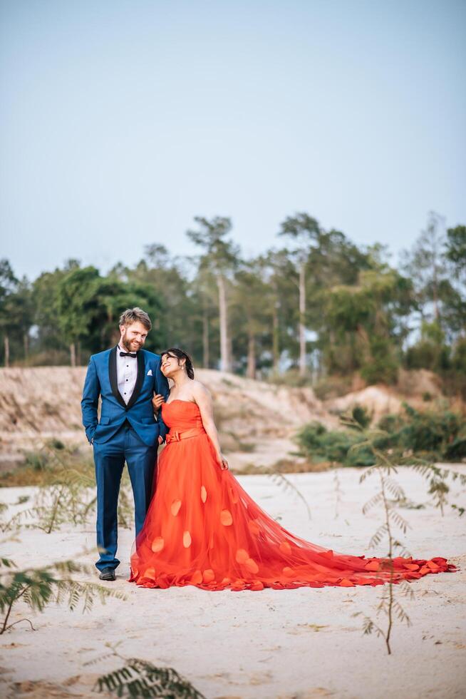 Asian bride and Caucasian groom have romance time and happy together photo