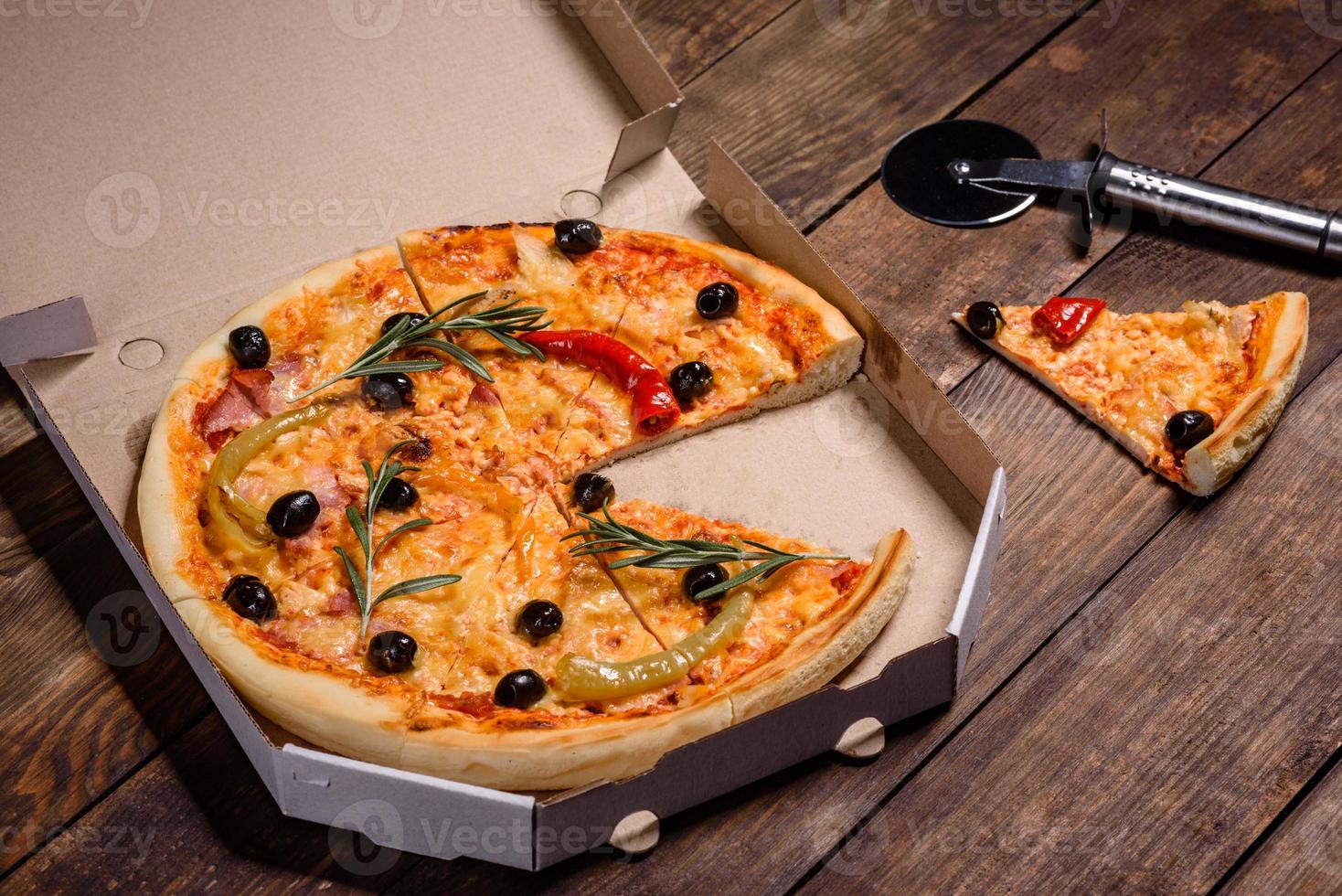 Tasty fresh hot pizza against a dark background. Pizza, food, vegetable, mushrooms photo