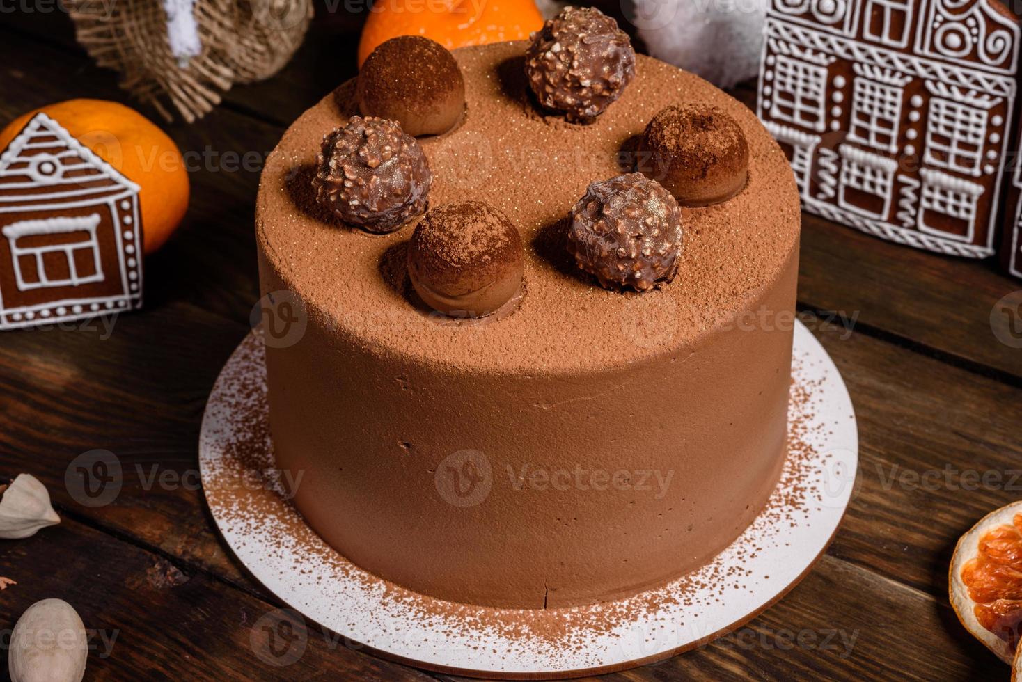 Delicious beautiful sweets on a dark wooden table on Christmas Eve photo