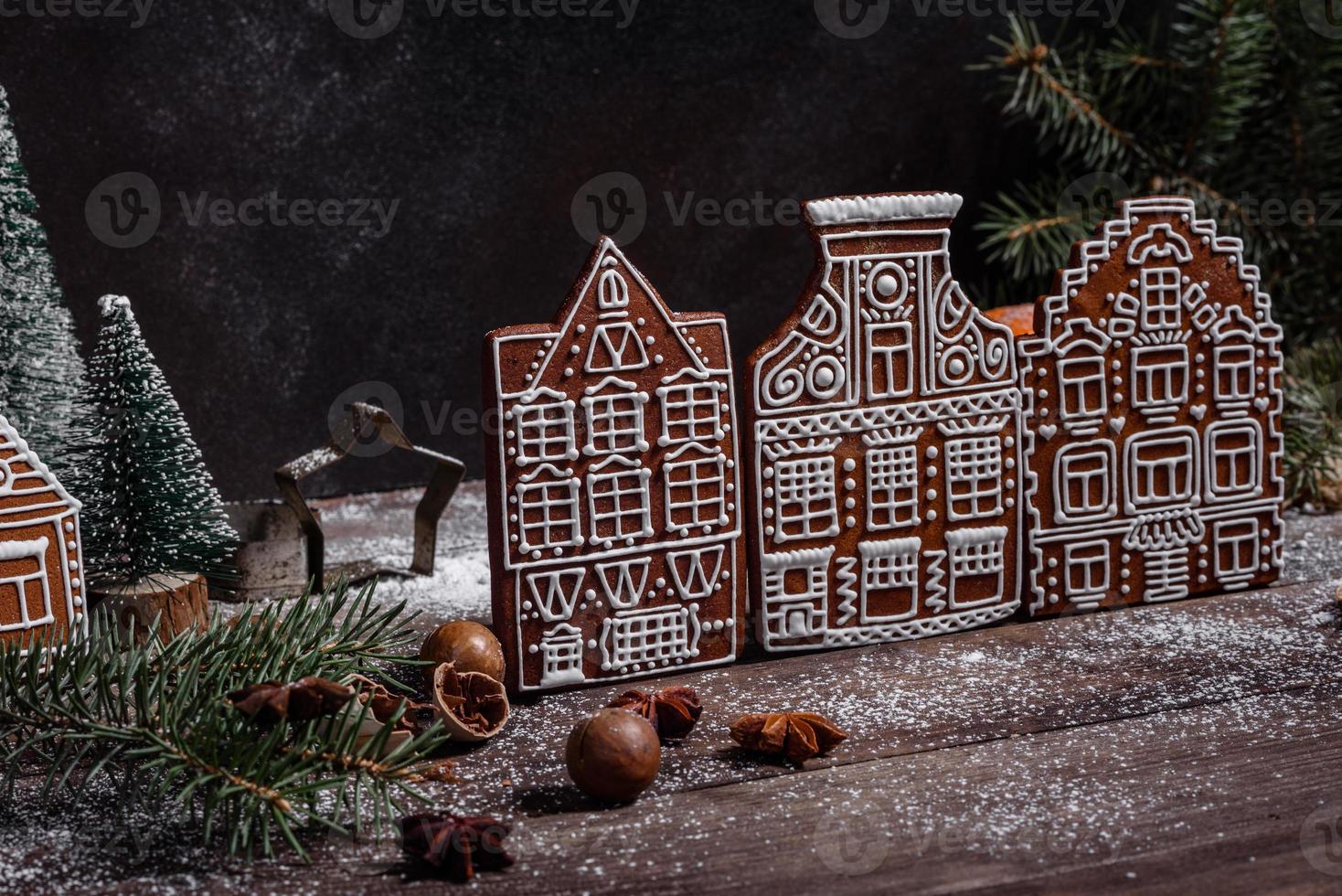 Delicious beautiful sweets on a dark wooden table on Christmas Eve photo