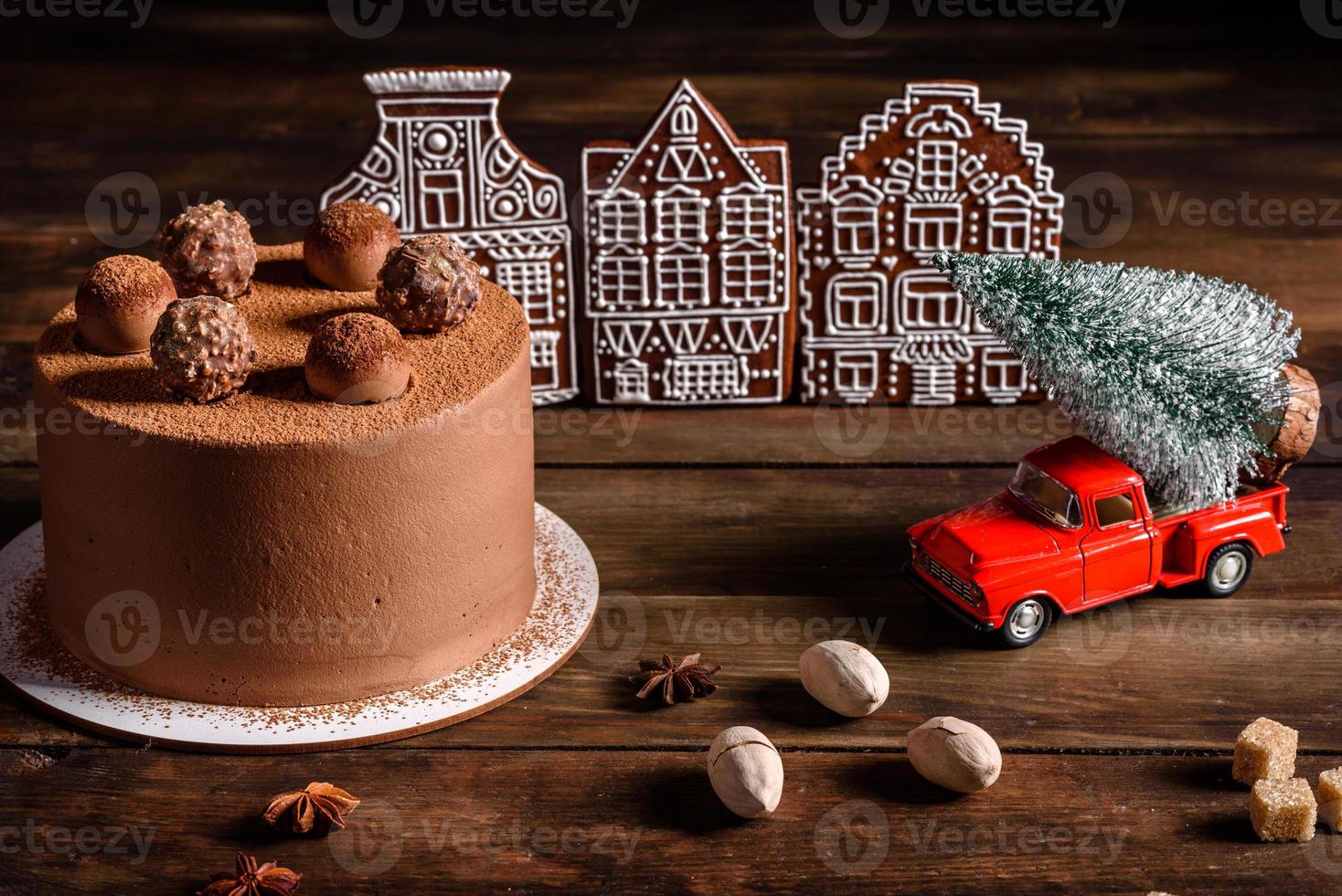 Delicious beautiful sweets on a dark wooden table on Christmas Eve photo