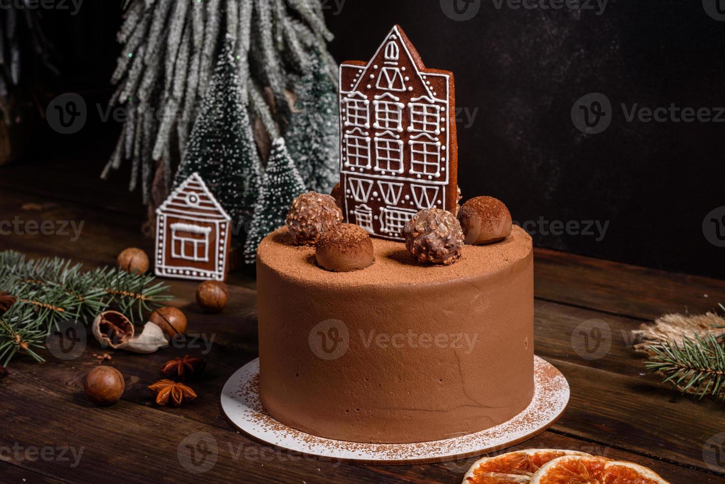 Delicious beautiful sweets on a dark wooden table on Christmas Eve photo