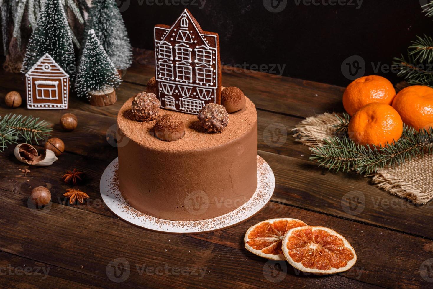 Delicious beautiful sweets on a dark wooden table on Christmas Eve photo