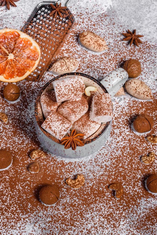 Mug of hot chocolate with white marshmallows photo