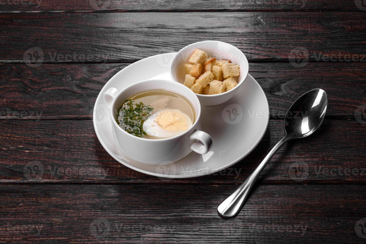 Asian noodle soup, ramen with chicken, vegetables and egg in white bowl photo