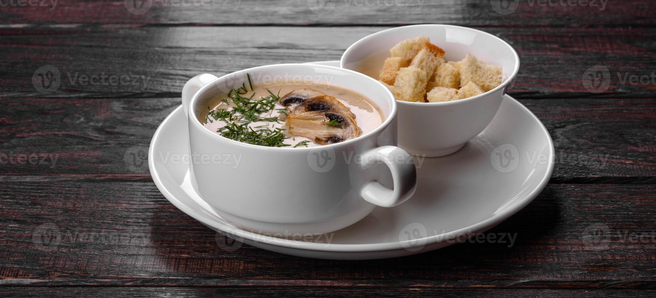 Cream of mushroom soup. Home-made with whole and sliced mushrooms photo