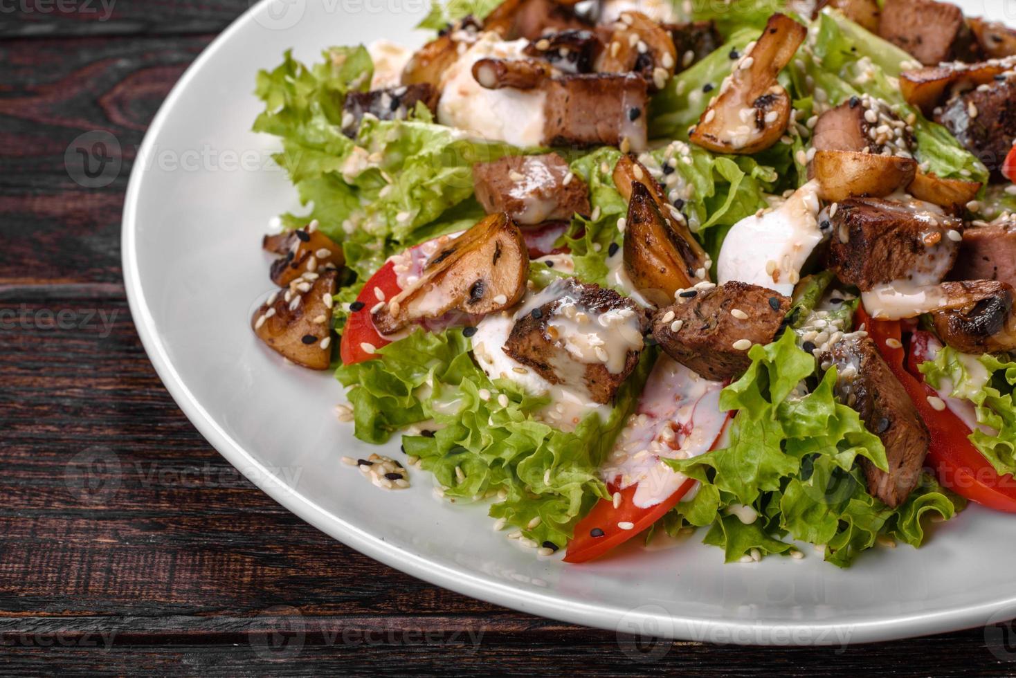 Delicious fresh beef salad for a festive table photo