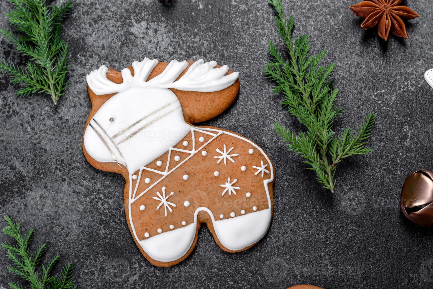 Christmas festive gingerbread made at home on a dark table photo