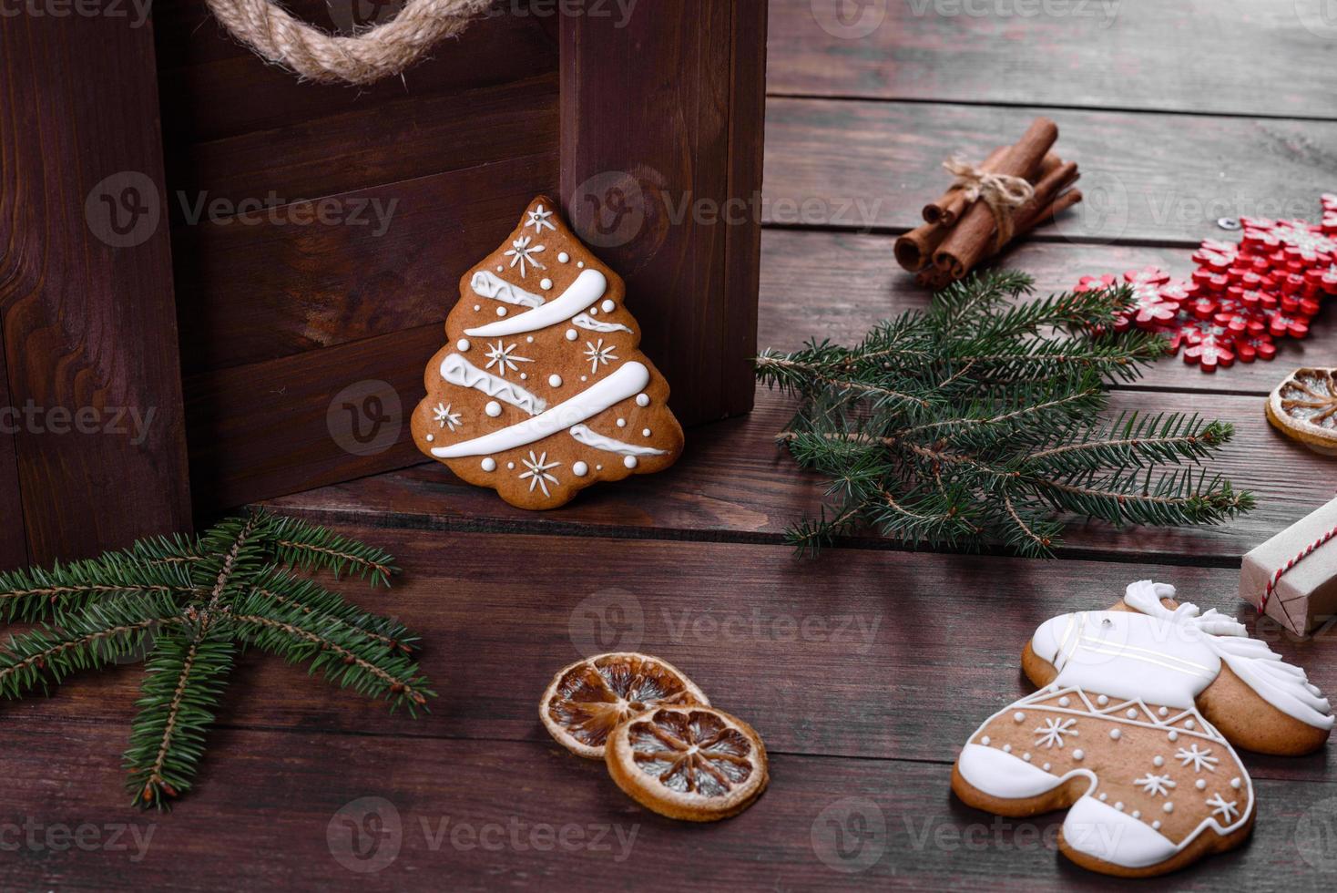 Christmas festive gingerbread made at home on a dark table photo