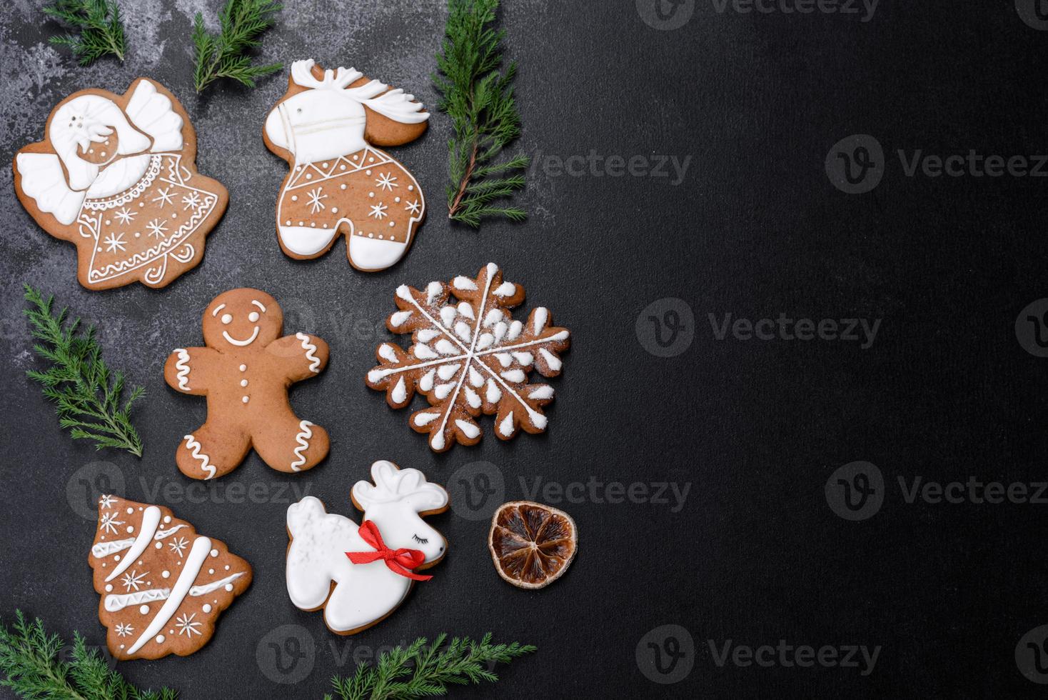 Christmas festive gingerbread made at home on a dark table photo