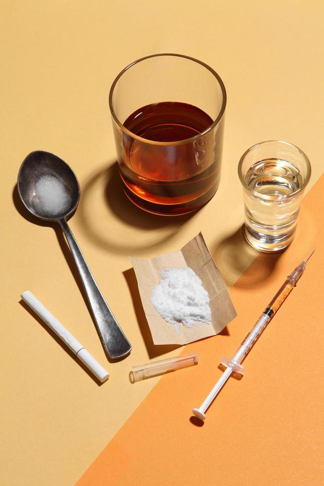 Cocaine in paper and equipment on color background, Background from cocaine party photo