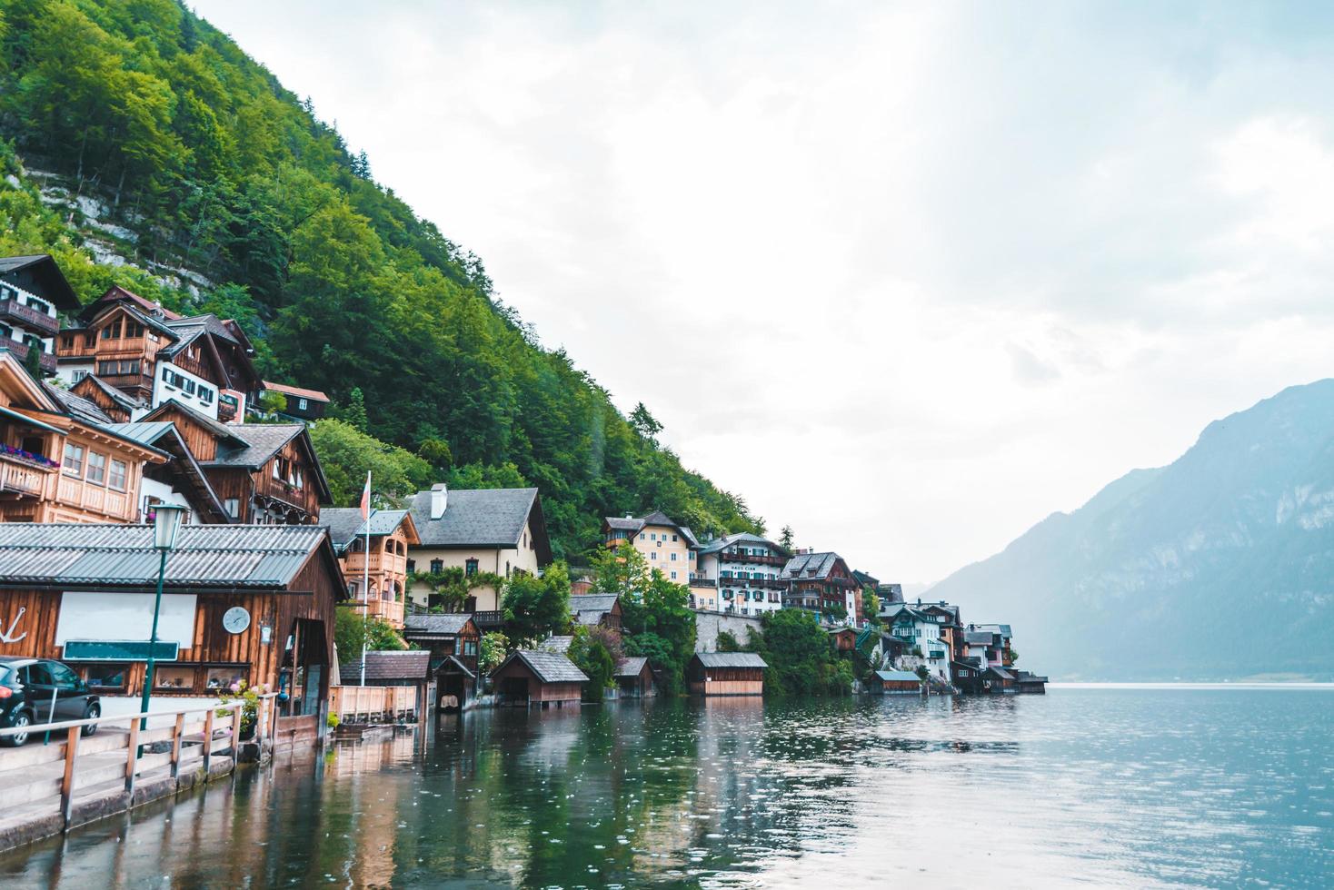 Hallstatt city quay with beautiful view of lake and alpine range photo