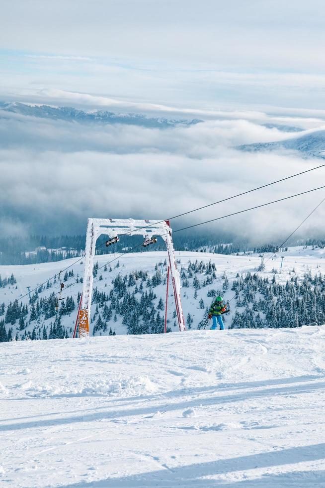 Above the sky view of ski yoke in mountains photo