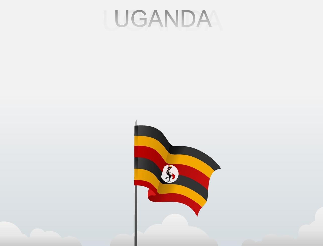 The Uganda flag is flying on a pole that stands tall under the white sky vector