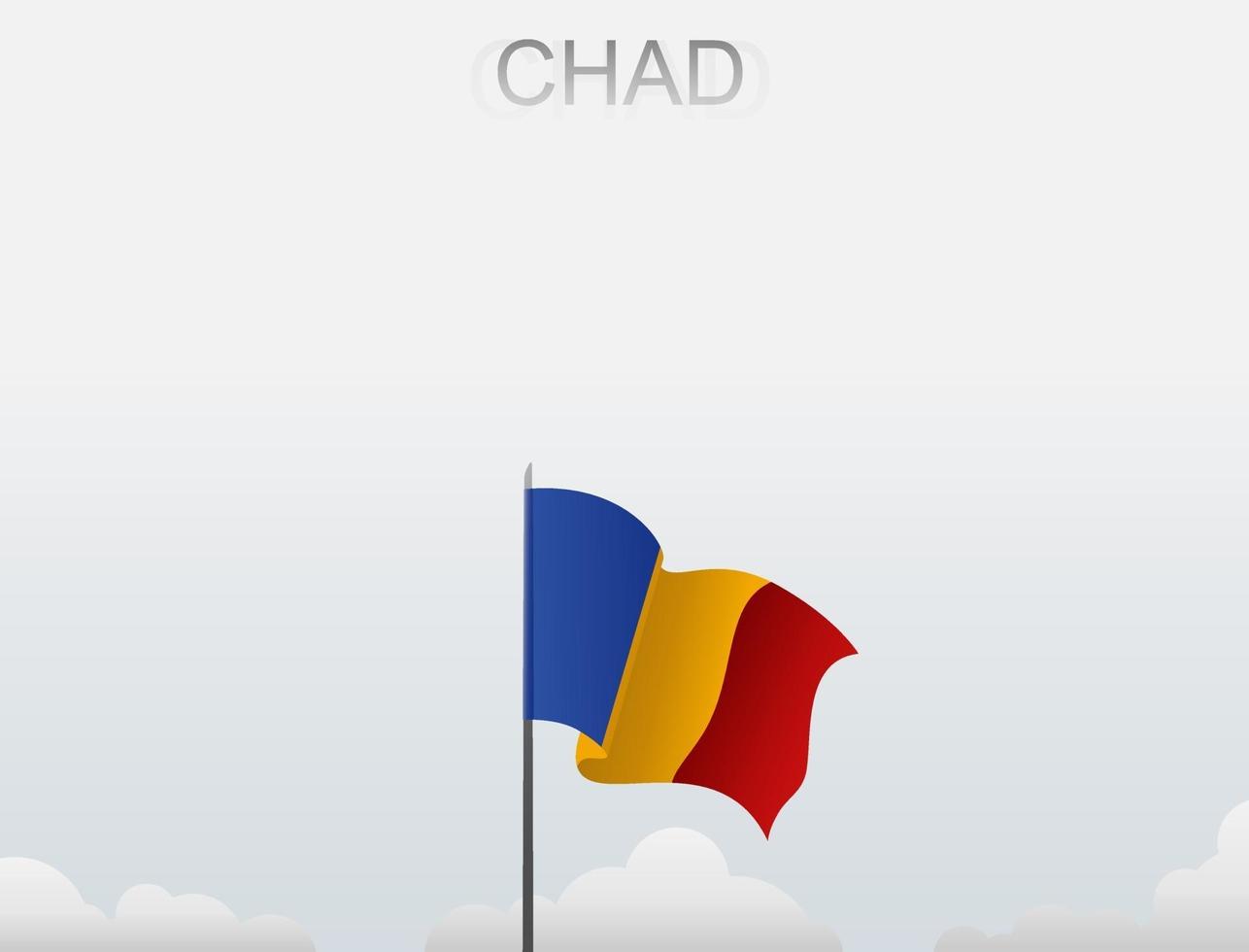 The Chad flag is flying on a pole that stands tall under the white sky vector