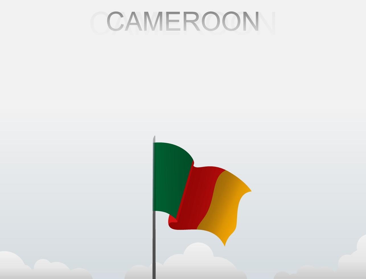 The Cameroon flag is flying on a pole that stands tall under the white sky vector