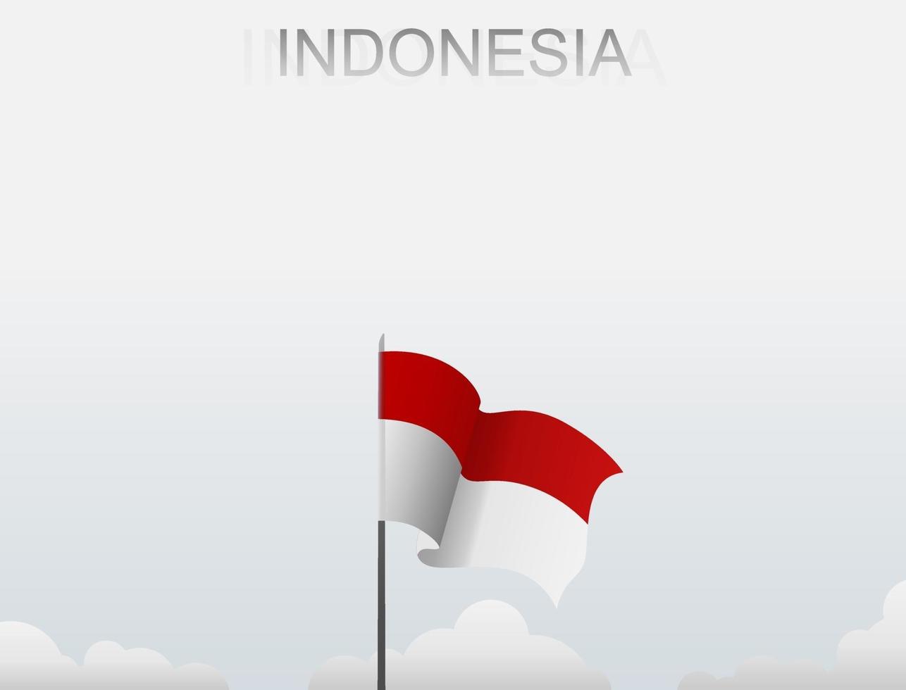 la bandera de indonesia vuela en un poste que se erige alto bajo el cielo blanco vector